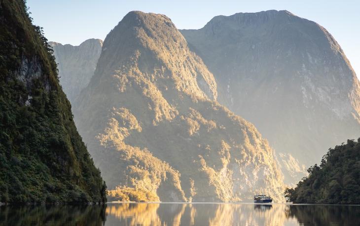 Stunning reflections on a Doubtful Sound Overnight Cruise - Real Journeys