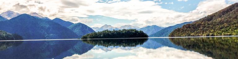 Fiordland mountains reflecting in Lake Hauroko