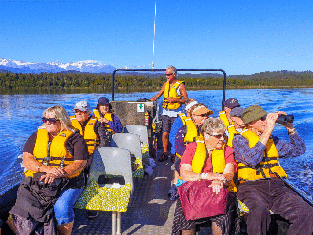 Guests cruising along Okarito Lagoon